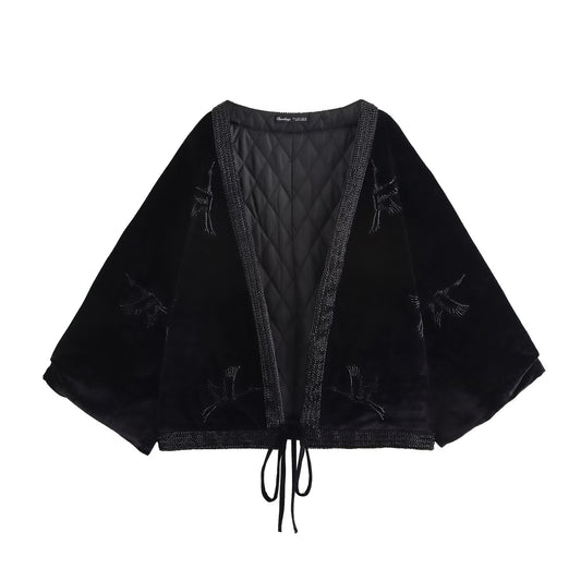 Manteau amincissant brodé de perles épaisses