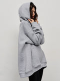 Sweat à capuche style street boyfriend en polaire avec poches amples