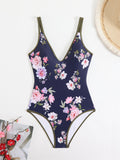 Sportlicher Badeanzug mit Animalprint und Blumenmuster