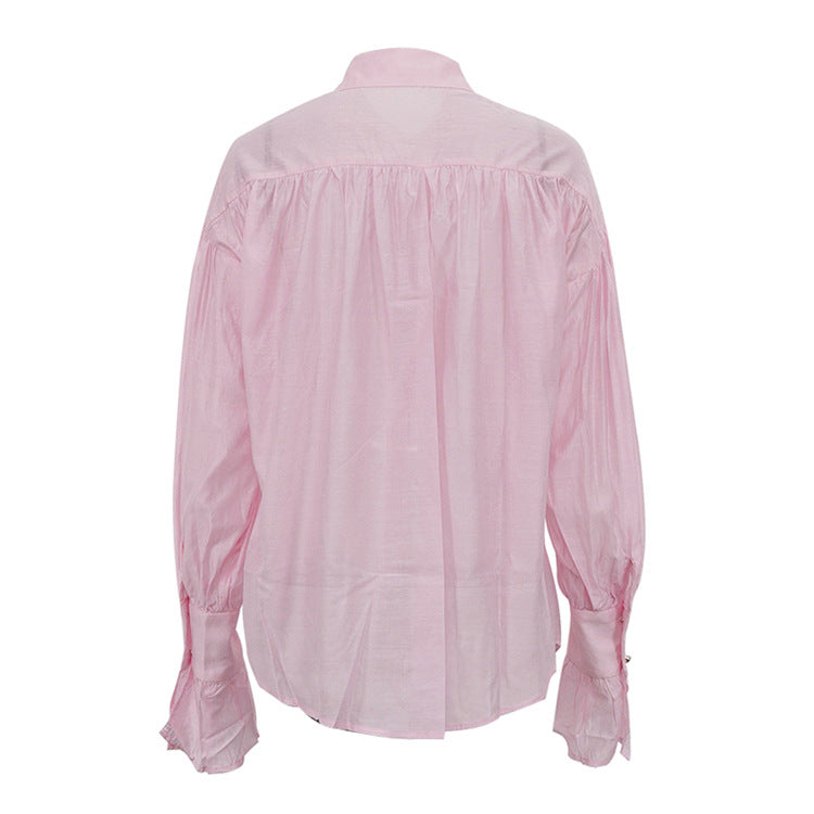 Chemise à manches longues et col polo ample de couleur unie