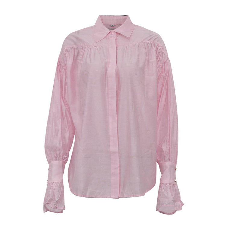 Chemise à manches longues et col polo ample de couleur unie