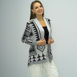 Cardigan châle tricoté à carreaux et pompons pour femme