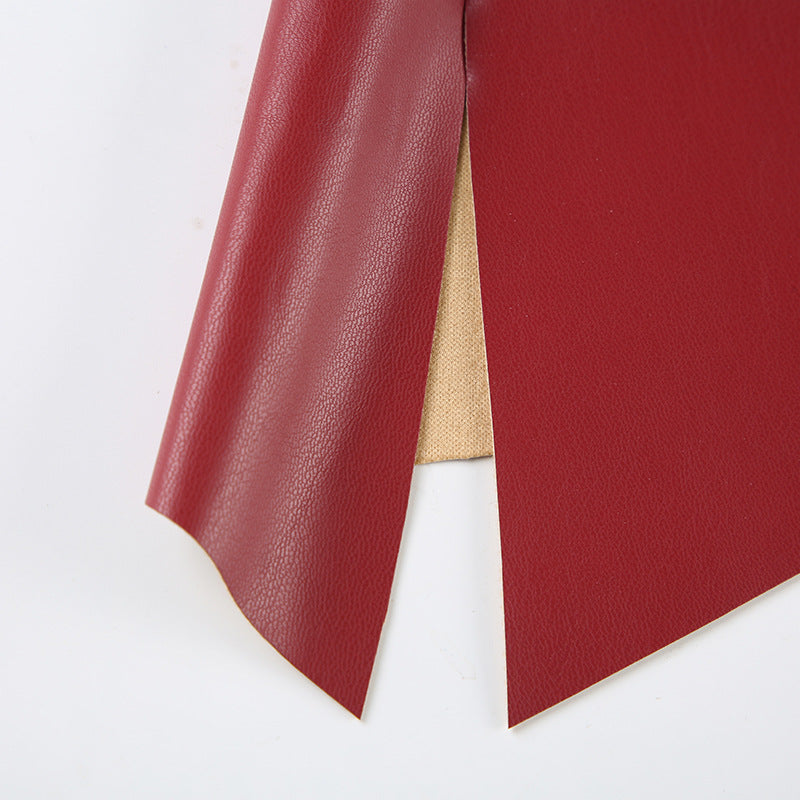 Asymmetrische Neckholder-Weste aus Leder mit Metallring